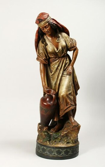A GOOD LARGE TERRACOTTA FIGURE OF A YOUNG ARAB GIRL