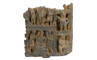A GREY SCHIST CARVED ARCHITECTURAL FRAGMENT WITH A BUDDHA IN MEDITATION Ancient region of Gandhara, 2nd - 3rd century