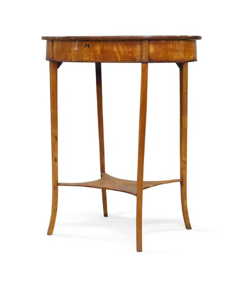 A George III satinwood oval work table, circa 1790, the hinged top inlaid with a rosewood lozenge, raised on splayed square tapered legs with a stretcher, with plaque for Apter Fredericks, 72cm high, 60cm wide, 45cm deep