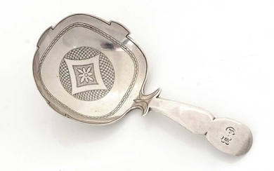 A George III silver engraved caddy spoon.