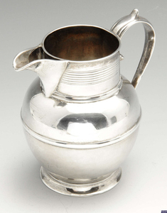 A George III small silver pitcher jug.