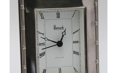 A 'HARRODS' SILVER FRAMED CLOCK, bound reed frame, Sheffield...