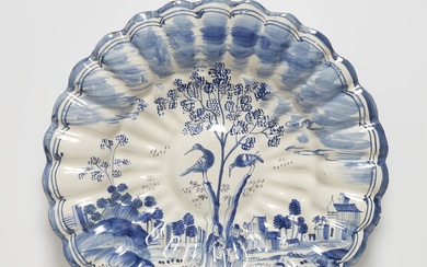 A Hanau faience fan platter with central tree motif