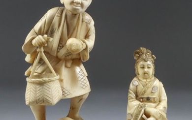 A Japanese Carved Ivory Okimono of a standing fruit...