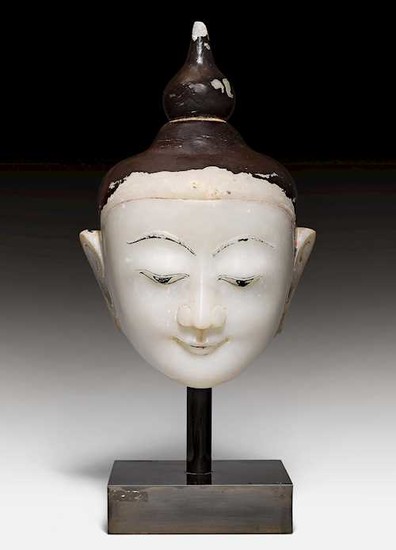 A LARGE ALABASTER HEAD OF BUDDHA.