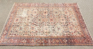 A LARGE PERSIAN KARAJA CARPET with seven central