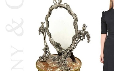A Large Tiffany & Co. Sterling Silver Figural Mirror
