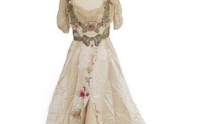 A Late 19th Century Ladies' Evening Dress, in cream silk...