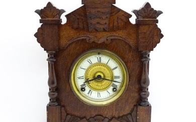 A Late 19thC / Early 20thC American oak cased mantle clock by the Ansonia Clock Company - New York