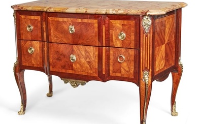 A Louis XV/XVI Transitional tulipwood commode