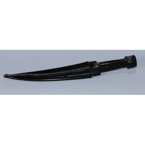 A Middle Eastern kindjahl dagger, 20cm curved blade with cen...