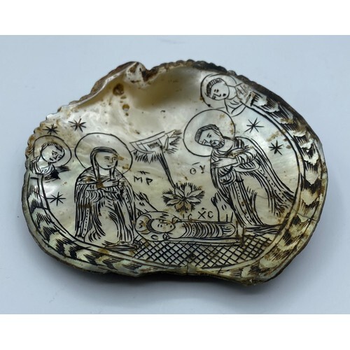 A Mother of Pearl Oyster Pilgrim's Pendant with a Nativity E...