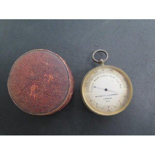 A Negretti & Zambra pocket barometer no 9210, 48mm diameter,...