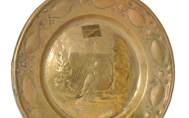 A Nuremberg brass alms dish, late 15th century