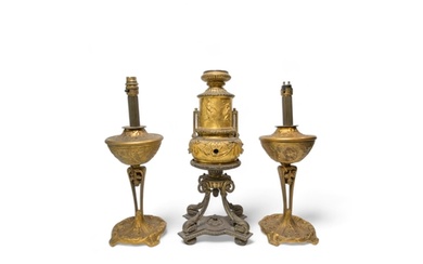 A PAIR OF BRASS OIL LAMP BASES DECORATED WITH HOLLY AND THIS...