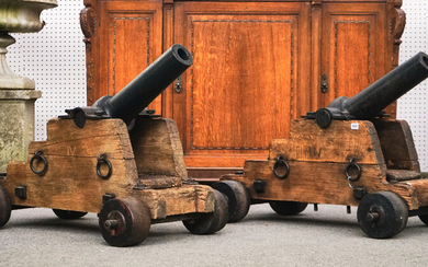 A PAIR OF CAST IRON SIGNAL CANNONS