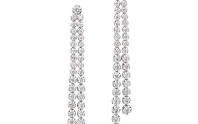 A PAIR OF DIAMOND DROP EARRINGS each set with a ro ...