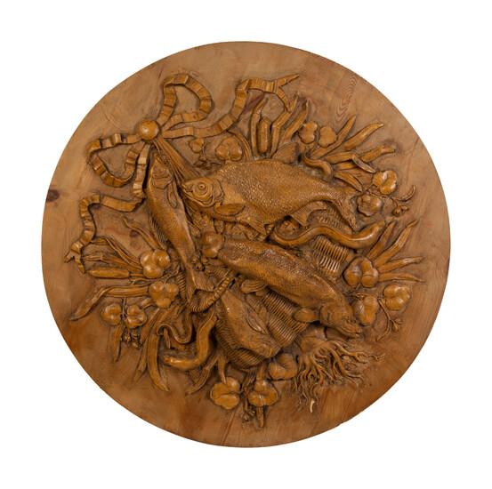 A Pair of Continental Carved Game Plaques Depicting Fish