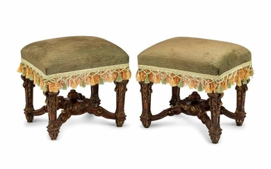 A Pair of Louis XIV Style Carved and Parcel Gilt