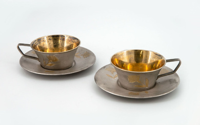 A Pair of Silver and Parcel Gilt Tea Cups and...