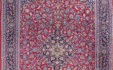 A Persian Hand Knotted Mashad Carpet, 292 X 192