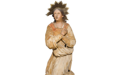 A Polychromed Carved Wood Figure Of A Kneeling Angel