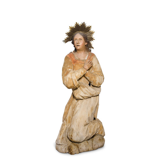 A Polychromed Carved Wood Figure Of A Kneeling Angel