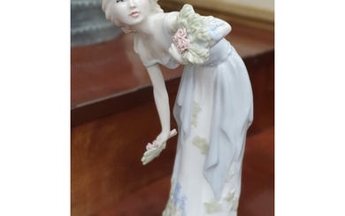 A Royal Doulton Figure of a woman from the Reflections serie...
