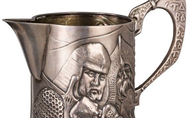 A Russian silver Art Nouveau creamer with bogatyr, Moscow, M. Tarasov, dated 1909
