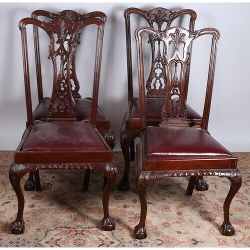 A SET OF FOUR CHIPPENDALE DESIGN MAHOGANY DINING CHAIRS each...
