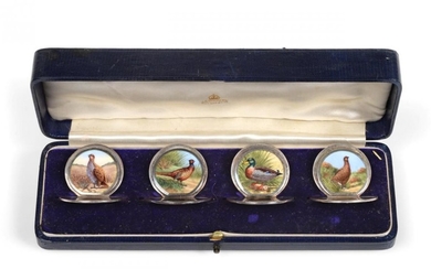 A Set of Four George V Enamelled Silver Place-Card Holders,...