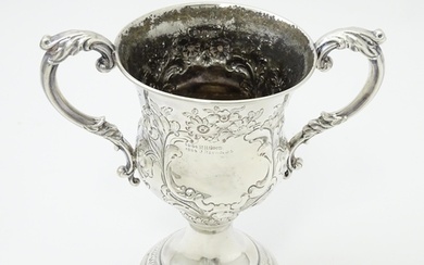 A Victorian silver twin handled trophy cup bearing inscripti...