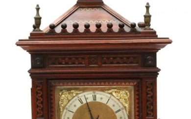 A Victorian walnut mantel clock