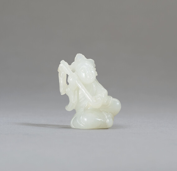 A WHITE JADE FIGURE OF A DAOIST IMMORTAL, QING DYNASTY (1644-1911)