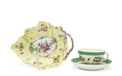 A WORCESTER 'SPOTTED FRUIT' CUP AND SAUCER Circa 1770 with a...