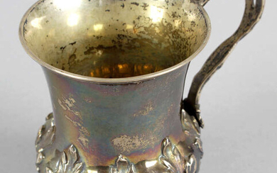 A William IV silver christening mug.