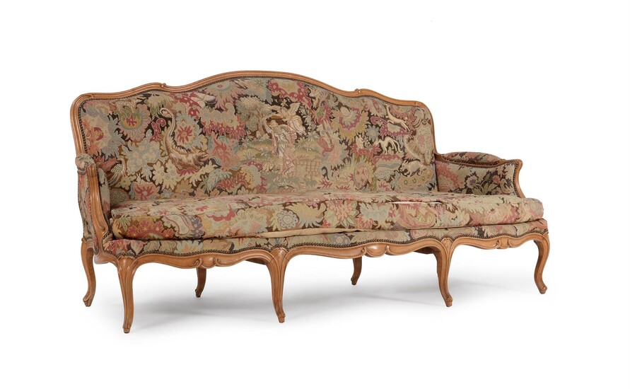 A beech and upholstered suite of seat furniture in Louis XV style
