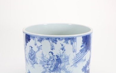 A blue and white landscape and figures brush pot