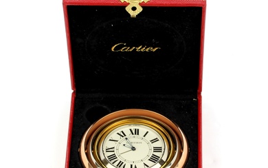 A boxed Trinity de Cartier travel/desk clock in yellow, white and rose gold plating (no. 563323GD).