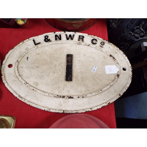 A cast iron late 19thC London and North Western Rail company...