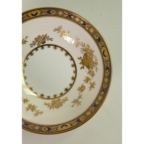 A collection of Minton Dynasty gilded dinnerware: Comprising...