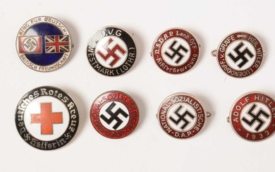 A collection of WWII enamel lapel badges