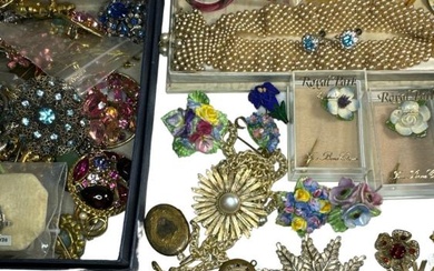 A collection of costume jewellery to include 65 brooches (including...