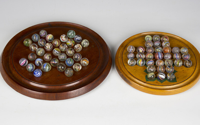 A collection of sixty-four Victorian and later glass marbles, diameters ranging from 14mm to 21mm, t