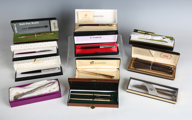 A collection of various pens, including a silver cased ballpoint in an Asprey box, a Sheaffer founta