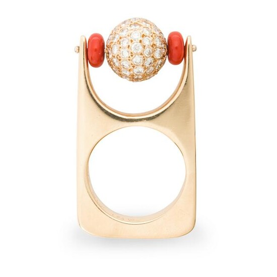 A diamond, coral and fourteen karat gold ring