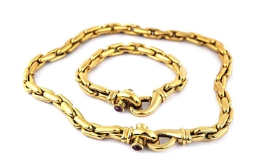 A fancy-link necklace and bracelet suite