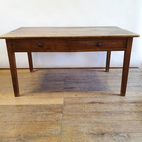 A fruitwood farmhouse table, with two frieze drawers, and tw...