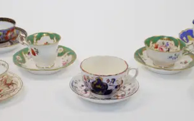 A group of English porcelain teacups and saucers, 19th century, to include...