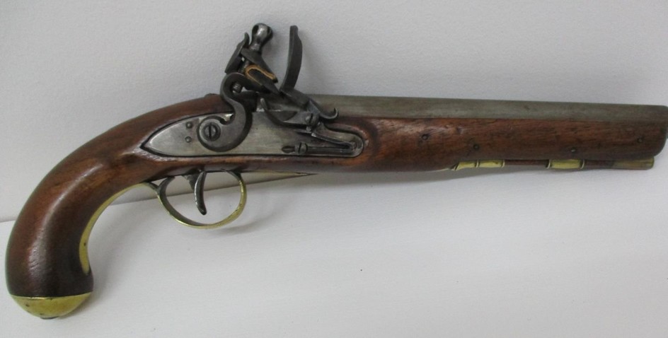 A late 18th/early 19th century flintlock pistol, the 9" barr...